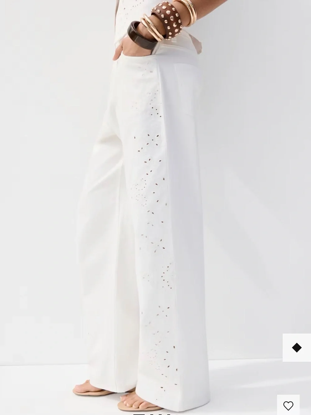 Balloon jeans with openwork embroidery